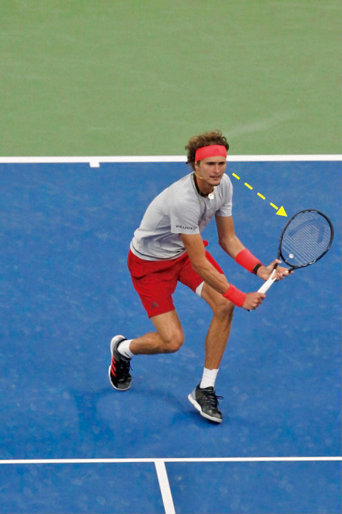 斜め前にセットして、ボール＆ラケットを視界に入れる(バックボレー)